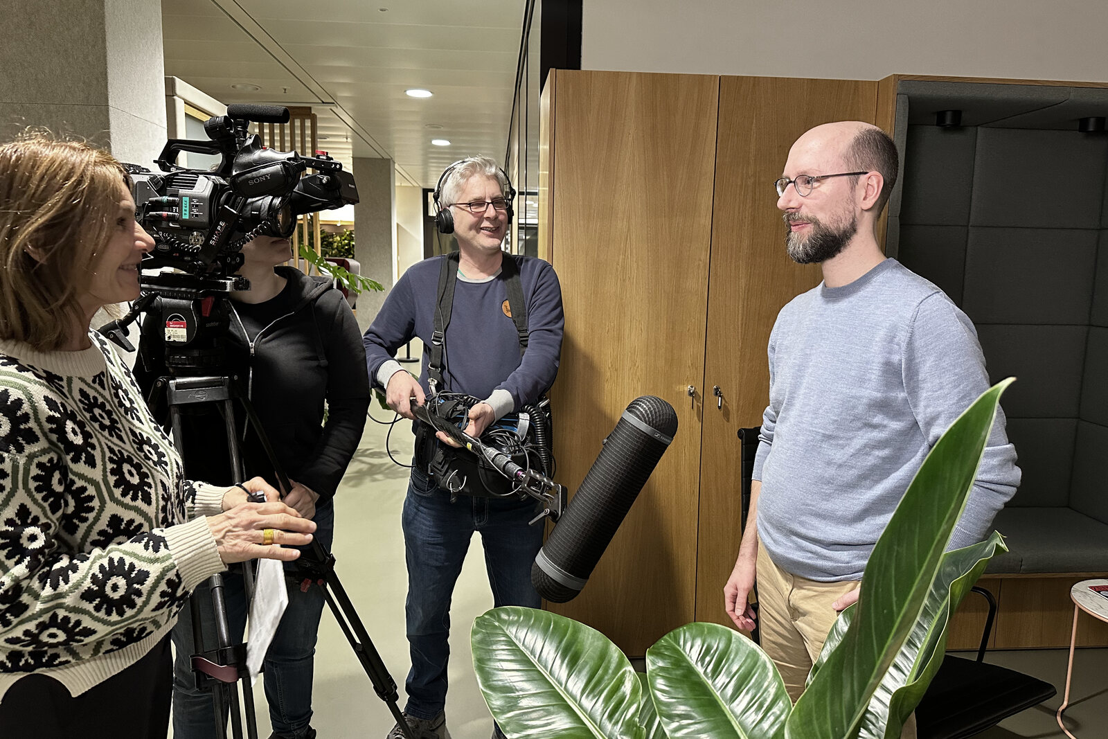 Christian Schulze in a television interview with a camera crew